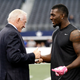 Dallas Cowboys team owner Jerry Jones, left, talks with wide receiver Dez Bryant, right, on the field before a NFL football game against the New York Giants Sunday, Oct. 28, 2012, in Arlington, Texas.